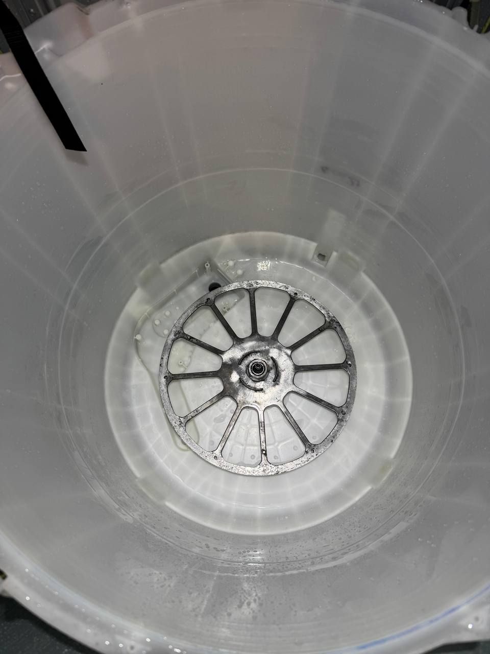 Same washer tub base clean after full disassembly and cleaning